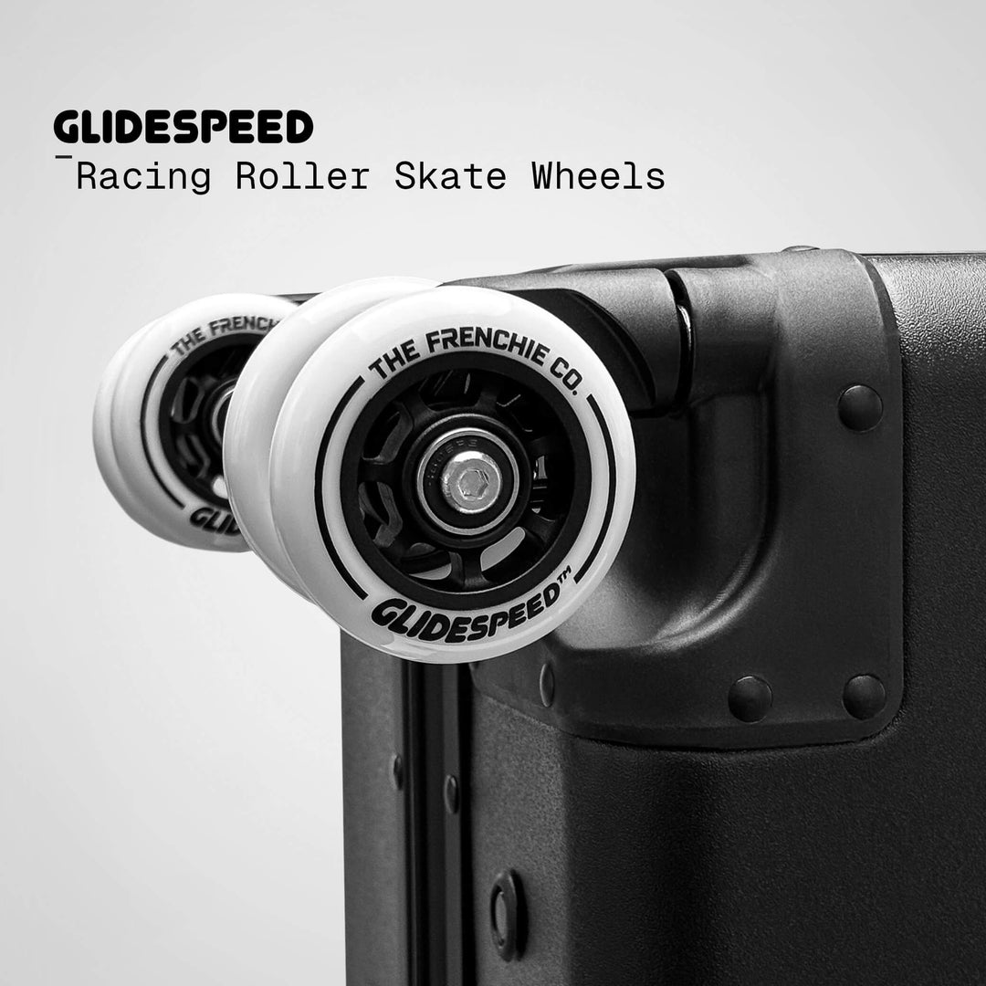 Close-up of Glidespeed racing roller skate wheels on a gray background