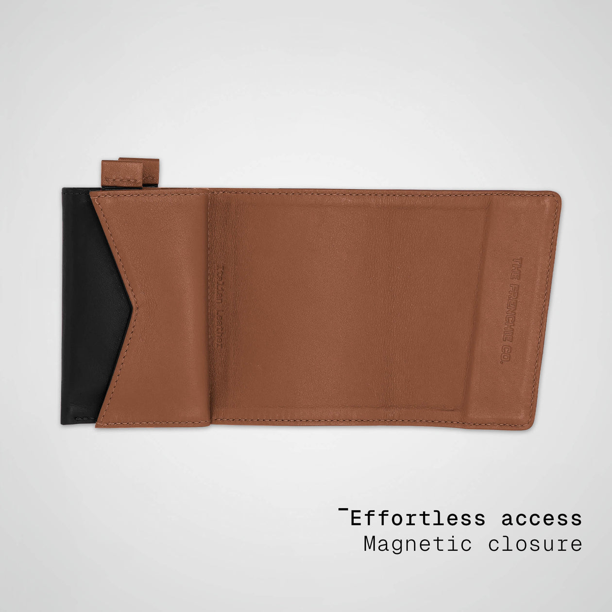 Brown leather cardholder with black interior on a light gray background