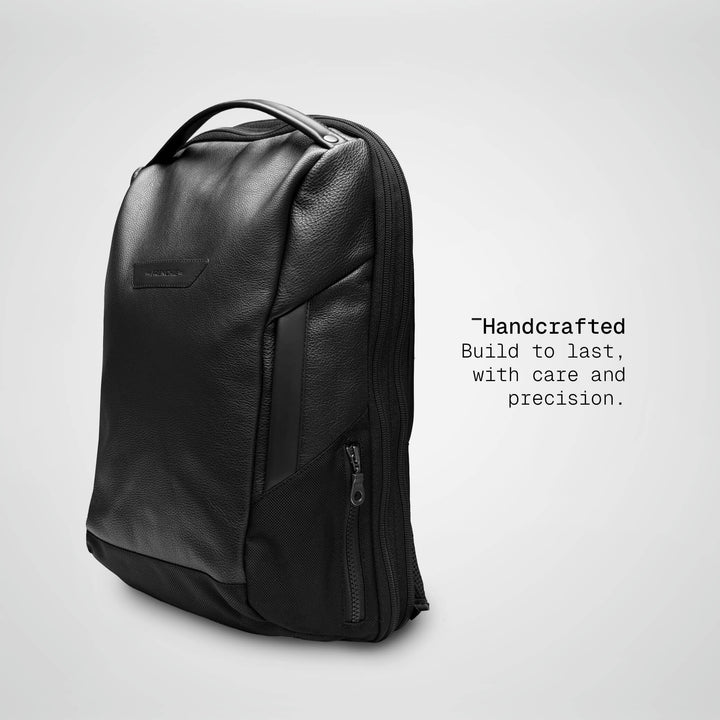 Black Vector Speed Backpack in leather, angled view