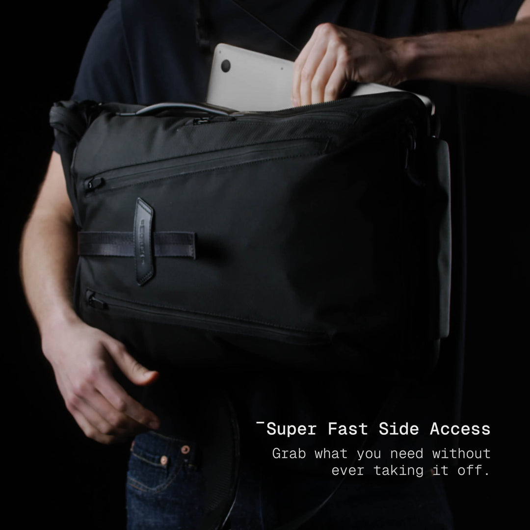 Person holding a black backpack with text 'Super Fast Side Access' on a dark background