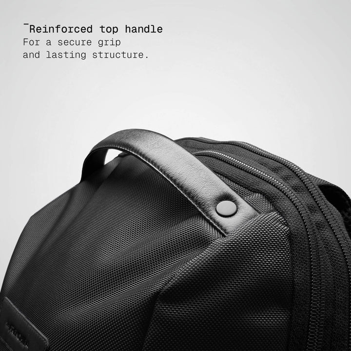 Top handle detail on the black Vector Speed Backpack