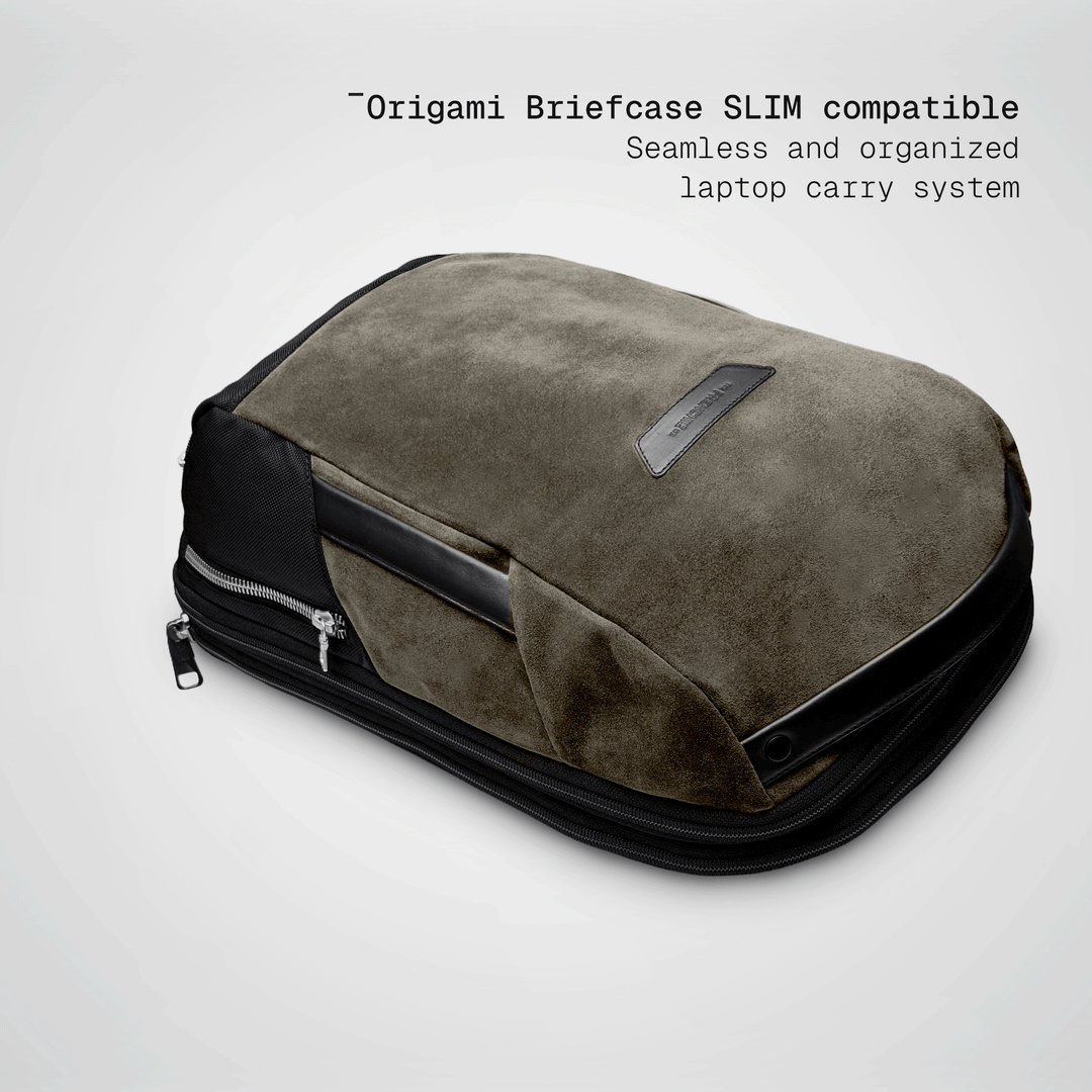 Slim briefcase sliding into the taupe Vector Speed Backpack