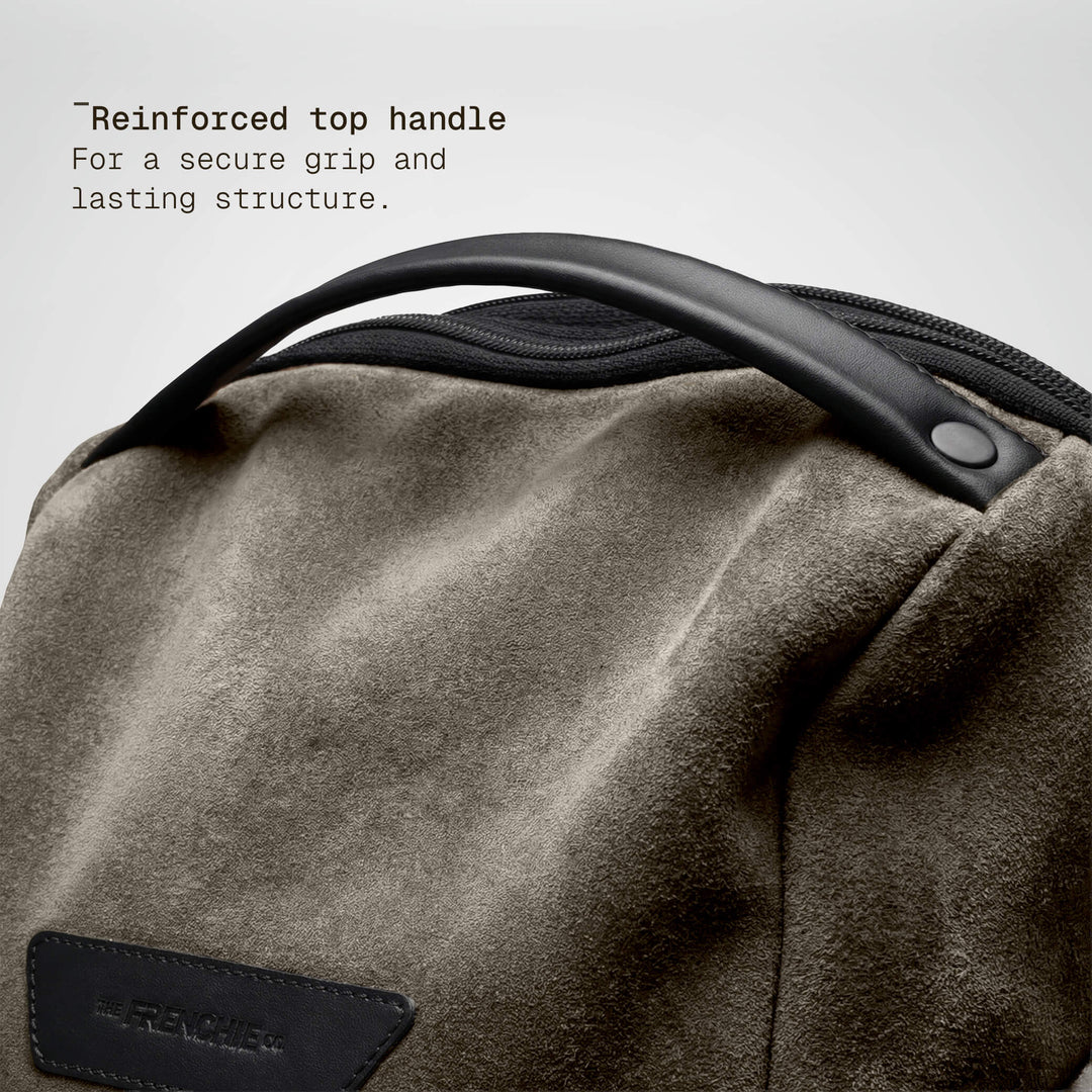 Top handle detail on the taupe Vector Speed Backpack