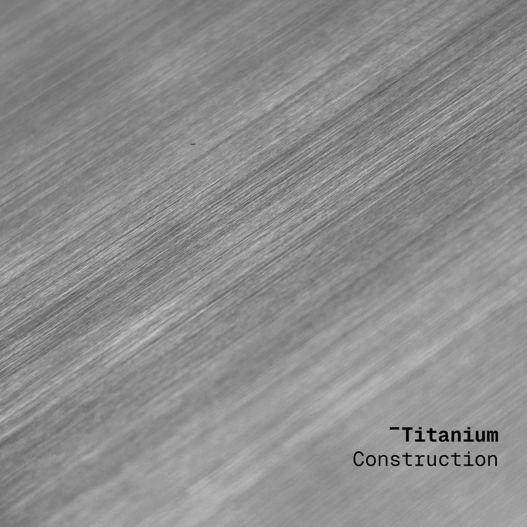 Metallic surface with 'Titanium Construction' text