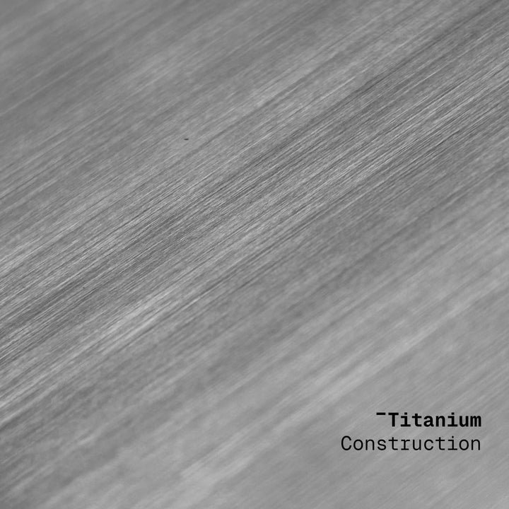 Metallic surface with 'Titanium Construction' text