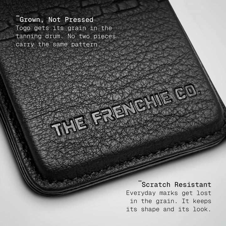 Close-up of the Togo calfskin and embossed logo on the Numbered wallet