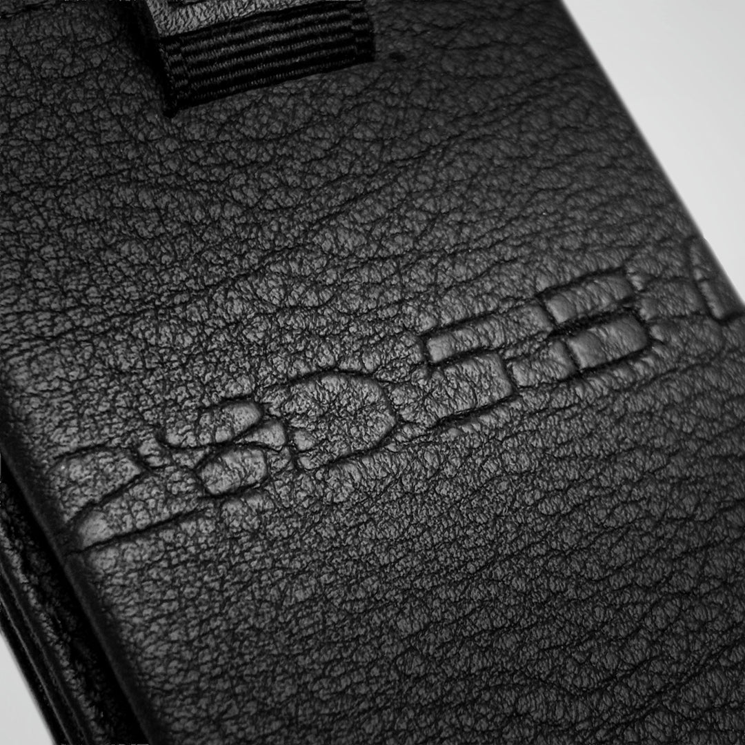 The hide's own number pressed into the Togo calfskin of the Numbered Speed Wallet Duo