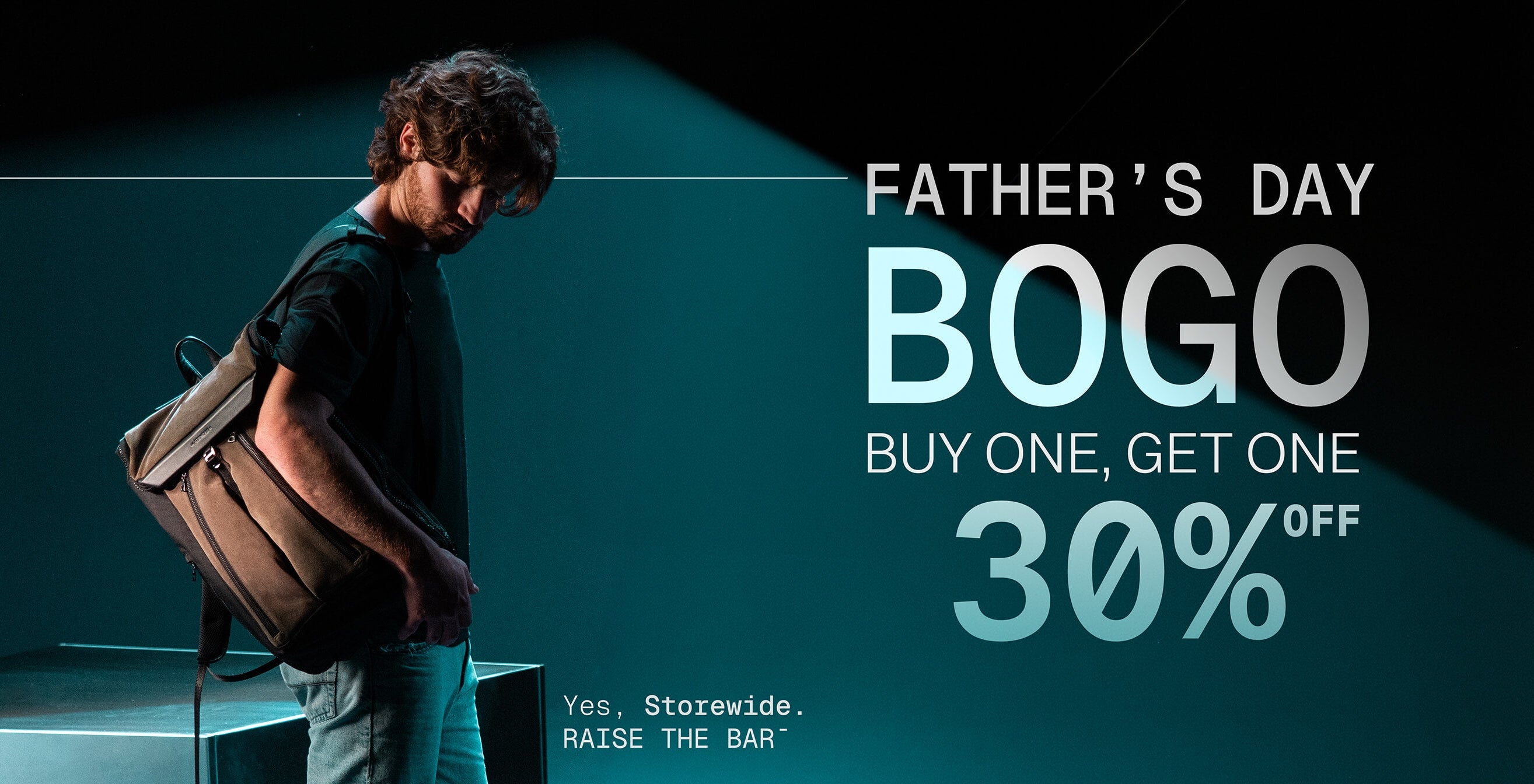 Promotional banner for Father's Day BOGO offer with a man holding a bag.